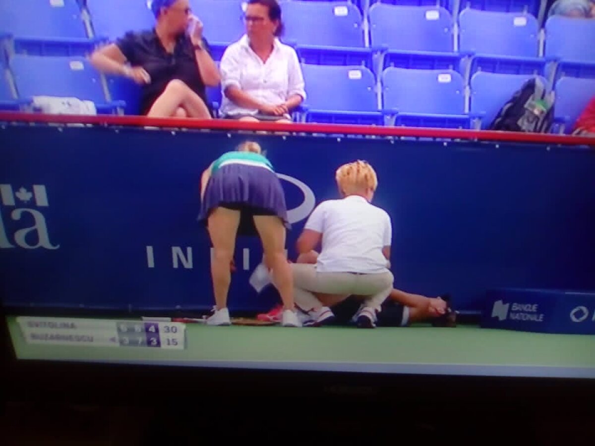 MIHAELA BUZĂRNESCU - ELINA SVITOLINA. Momente ȘOCANTE! Buzărnescu la pământ, plânge și urlă de durere! Imagini incredibile: Elina Svitolina a venit de urgență cu gheață! Doctorii au intervenit de 5 minute și jucătoarea noastră nu se poate ridica