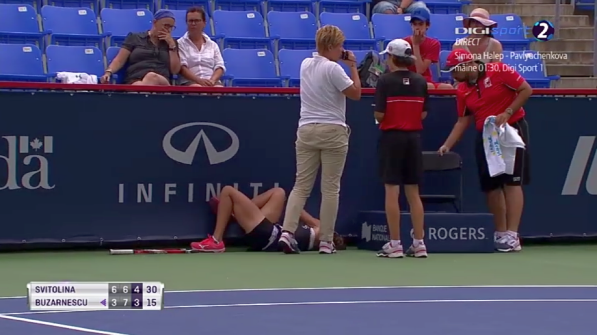 MIHAELA BUZĂRNESCU - ELINA SVITOLINA. Momente ȘOCANTE! Buzărnescu la pământ, plânge și urlă de durere! Imagini incredibile: Elina Svitolina a venit de urgență cu gheață! Doctorii au intervenit de 5 minute și jucătoarea noastră nu se poate ridica