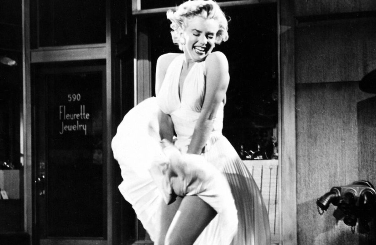 FOTO A pățit-o ca Marilyn Monroe » Un fotomodel a rămas cu rochița în vânt în plină stradă