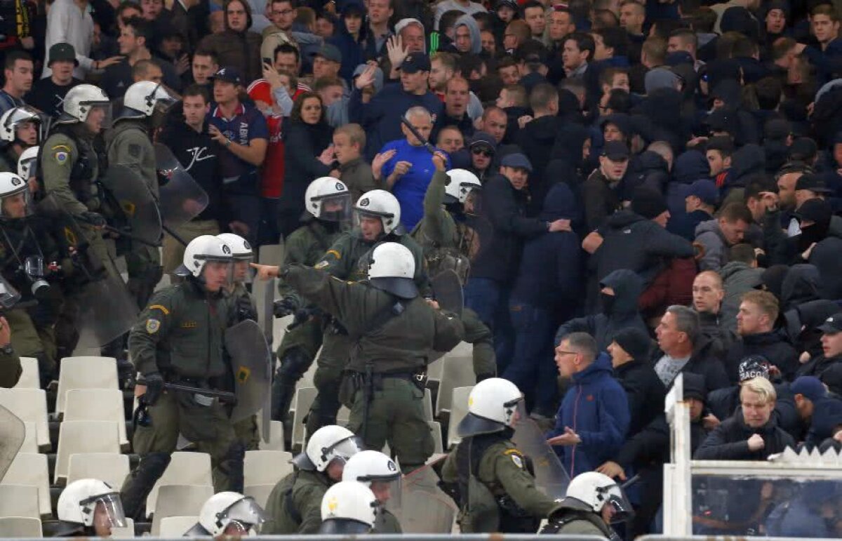 GALERIE FOTO Atenție, imagini dure! Violențe fără precedent la AEK Atena - Ajax: sticle incendiare și lupte grele cu forțele de ordine