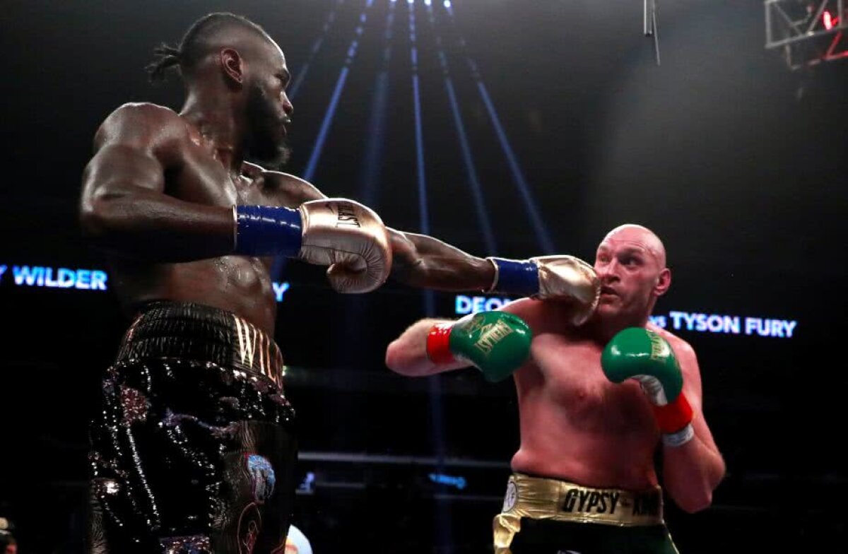 VIDEO+FOTO Furyos și iute » Verdict controversat în Wilder vs. Fury! Britanicul a dominat lupta, însă a fost pus de două ori la podea