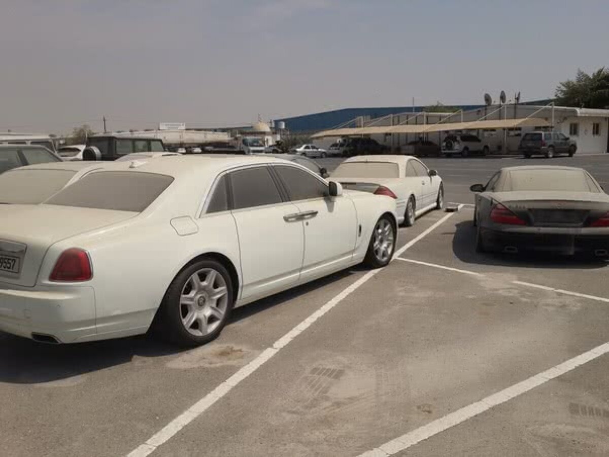VIDEO&FOTO Imagini de necrezut: mii de mașini scumpe abandonate în cimitirul auto din Dubai