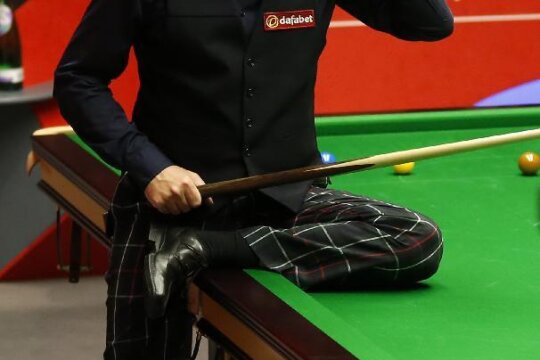 Alan McManus și pantalonii lui ridicoli, foto: news.xinhuanet.com