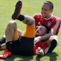 Ribery (dreapta) şi Contento plănuiesc farsa zilei // Foto: Reuters