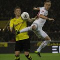 Alex Maxim (dreapta) are mai multe pase decisive în Bundesliga decît Reus (Dortmund)