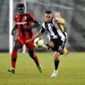 Bucșa (dreapta) și colegii săi au reușit prima surpriză din Liga 1 în 2014