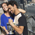 Fabio Fognini a însoţit-o pe Flavia Pennetta la şedinţa foto tradiţională cu campioana de la US Open // Foto: Reuters