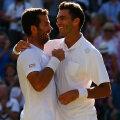 Horia Tecău (dreapta) şi Jean-Julien Rojer, sărbătorind victoria de la Wimbledon // Foto: Guliver/GettyImages