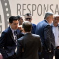 Justin Ștefan, cu ochelari, în spatele lui Burleanu. Foto: arhivă