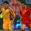 Djalovici (dreapta, în duel cu Săpunaru la amicalul România - Muntenegru din 2008), are 24 de meciuri și 2 goluri în L1 pentru Rapid și a mai jucat la Steaua Roșie, Bielefeld ori Rijeka