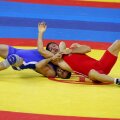 Ștefan Gheorghiță (echipament roșu) într-un meci la Jocurile Olimpice de la Beijing 2008 // FOTO GulliverGetty Images