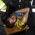 Helio Neto, transportat pe targă. 71 de persoane și-au pierdut viața în accident // FOTO AFP