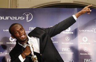 Usain Bolt l-a învins pe Roger Federer