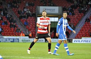 Gabriel Tamaş a fost în prim-plan la Doncaster în meciul cu Huddersfield, 2-0