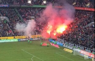 VIDEO Incidente la derby-ul Borussia Monchengladbach - FC Koln! Fanii au intrat pe teren şi s-au bătut cu forţele de ordine