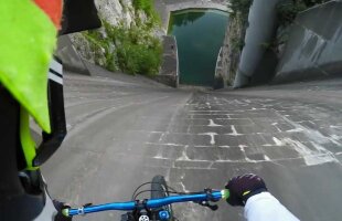 VIDEO Ți se taie respirația! Coborârea nebună făcută de un biciclist pe peretele unui baraj