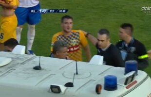 VIDEO Moment incredibil la meciul dintre Iași și Petrolul » Un jucător a fost forțat de arbitru să urce în ambulanță