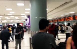 VIDEO Călătorii de pe Aeroportul din Toronto au rămas mască atunci când s-au uitat la tavan. Uite cine îi privea!