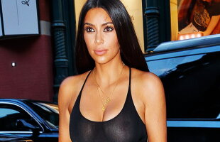 GALERIE FOTO Kim Kardashian, cu sânii la vedere în faţa a zeci de fani
