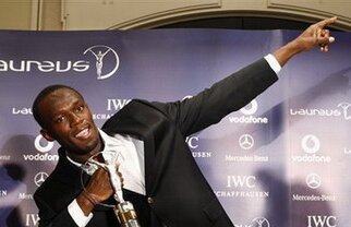 Usain Bolt l-a învins pe Roger Federer