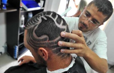 VIDEO & FOTO "Pitbull" îşi merită porecla! Ex-rapidistul şochează Portugalia cu noul său look!