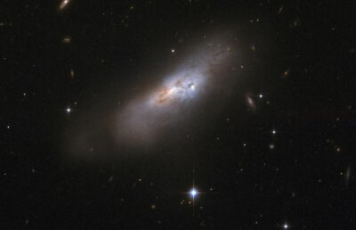 Hubble a descoperit o nouă galaxie de tip spirală