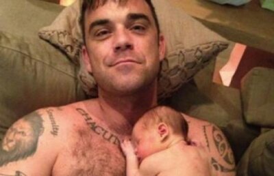 Robbie Williams: "Ador sa fiu tata. Acum, viata e mult mai frumoasa pentru mine"