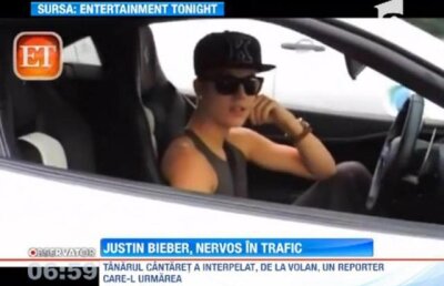 Justin Bieber s-a certat cu un ziarist de la volanul masinii sale Ferrari