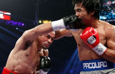 VIDEO Pumnul carierei » Juan Manuel Marquez l-a învins prin KO pe Manny Pacquiao la a patra luptă directă
