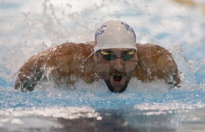 Michael Phelps, prima victorie » Americanul s-a impus într-o probă din Grand Prix-ul de la Charlotte
