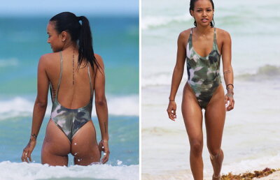 Garantat te va face să o iei razna! Un model american, exagerat de sexy pe plajă