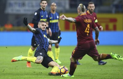 Nu renunță la titlu! » AS Roma s-a impus pe terenul Interului, după o dublă de senzație a lui Nainggolan