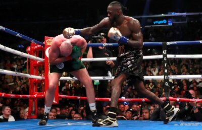 VIDEO+FOTO Furyos și iute » Verdict controversat în Wilder vs. Fury! Britanicul a dominat lupta, însă a fost pus de două ori la podea