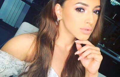 FOTO Gimnasta Larisa Iordache, apariție de senzație la nunta fratelui ei » A atras toate privirile într-o rochie transparentă