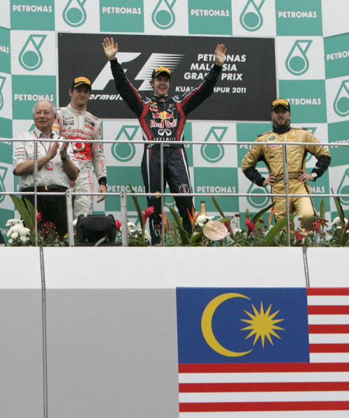 Jenson Button, Sebastian Vettel şi Nick Heidfeld