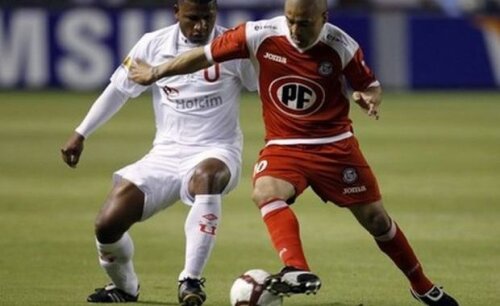 Miguel Angel Gonzales (în roşu)