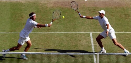 Lindstedt (stînga) şi Tecău vor ca anul acesta să facă un pas peste performanţa de anul trecut de la Wimbledon Foto: Guliver/GettyImages