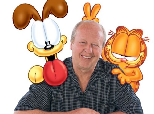 Caricaturistul Jim Davis și creațiile sale: motanul Garfield și prietenul său, cățelușul Odie