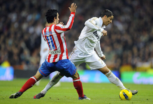 Ronaldo (în alb) a dat 20 de goluri în 19 meciuri stagionale cu Real. FOTO Reuters