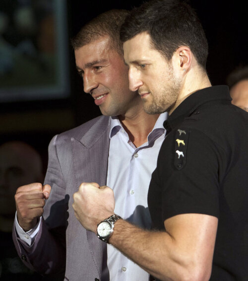 Lucian Bute şi Carl Froch şi-au încordat muşchii la conferinţa de presă de la Montreal.