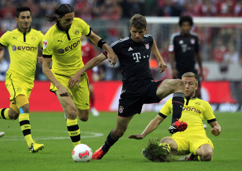 Bavarezul Thomas Muller, în prim-plan, a fost ținut la respect sezonul trecut de fundașii Dortmundului: 0 goluri, 3 eșecuri