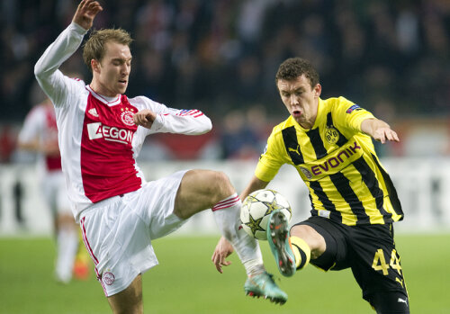 Eriksen (stînga, în meciul cu Dortmund, din Ligă) a venit la Ajax în 2008, cînd avea 16 ani // Foto: Reuters