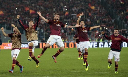 De Rossi (omul meciului, în centru) și colegii sărbătoresc al optulea triumf la rînd. Recordul lui Juve e la un pas distanță // Foto: Reuters
