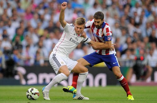 Duelul dintre Kroos și Koke (dreapta) va fi una dintre cheile de la mijloc ale derbyului madrilen // 
Foto: Guliver/GettyImages