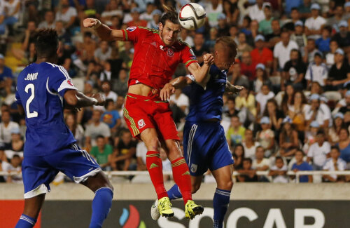 Dacă la Real a dat 3 goluri în ultimele 22 de meciuri, Bale (în roșu) rămîne esențial pentru galezi, reușind unicul gol la Nicosia // Foto: Reuters