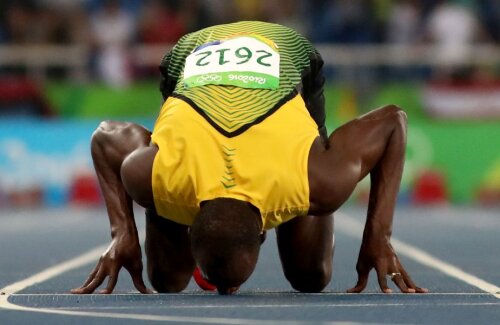 Bolt a sărutat linia de sosire a cursei // Foto: Getty Images