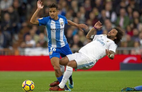 Rosales, fundașul dreapta al celor de la Malaga, în duel cu Marcelo. foto: Guliver/GettyImages