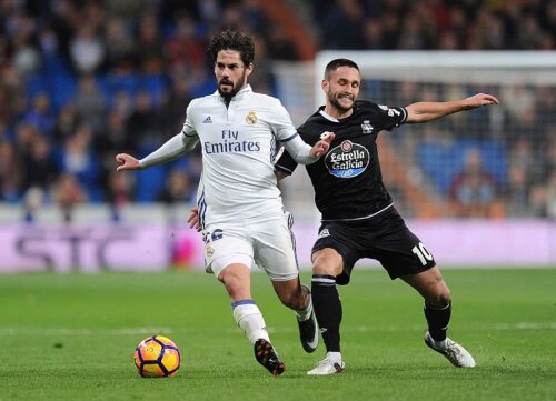 Florin Andone în duel cu Isco FOTO: Guliver/GettyImages