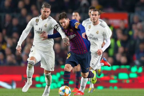 Leo Messi în duel cu Sergio Ramos // FOTO: Guliver/GettyImages