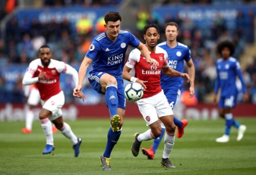 Maguire (în albastru) // Foto: Guliver/GettyImages